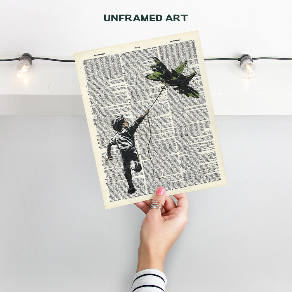 Banksy Graffiti Wall Art Poster - Military, Air Force Fighter Jet - Gift for Street Art Fans - Urban Mural Photo Poster, Home Decor, Boys or Kids Room Decoration - 8x10 UNFRAMED Boy With Plane